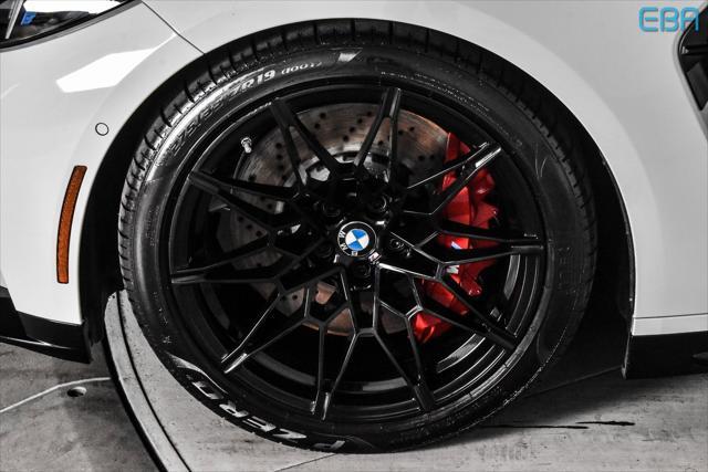 used 2025 BMW M4 car, priced at $94,880