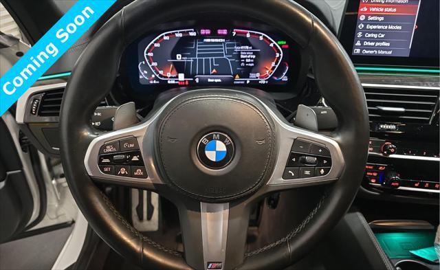 used 2023 BMW M550 car, priced at $61,880
