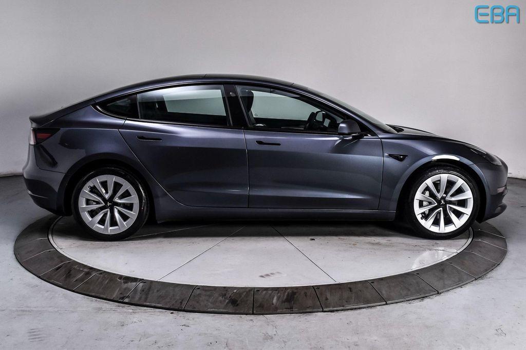 used 2023 Tesla Model 3 car, priced at $27,380