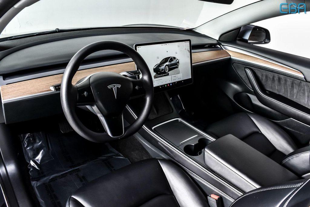 used 2023 Tesla Model 3 car, priced at $28,480