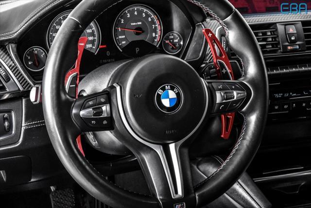 used 2018 BMW M4 car, priced at $50,880