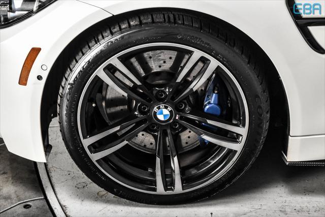 used 2018 BMW M4 car, priced at $50,880