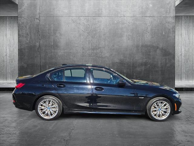 used 2023 BMW 330e car, priced at $29,224