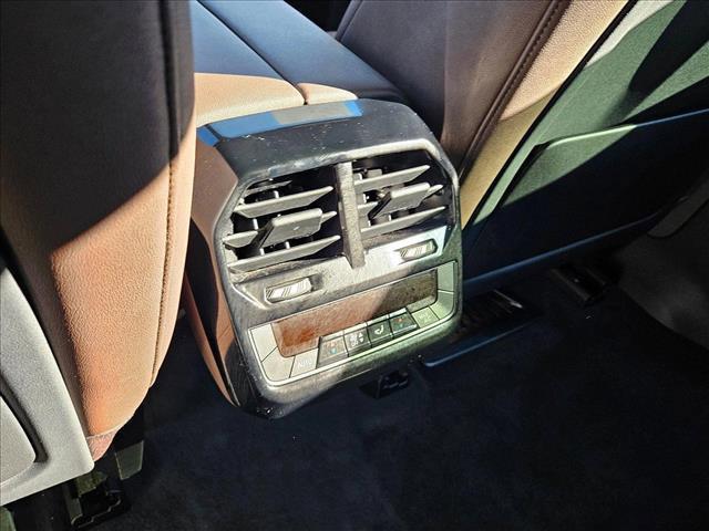 used 2024 BMW iX car, priced at $58,444