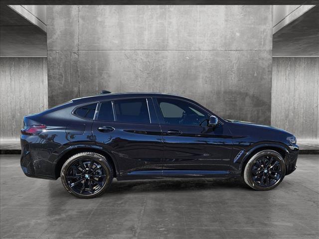 used 2022 BMW X4 car, priced at $39,997