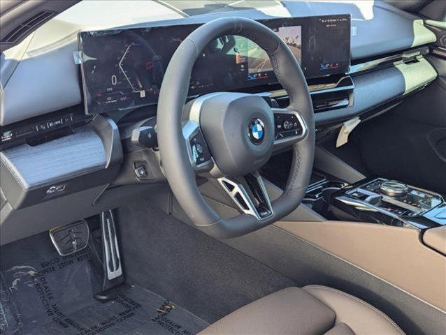 new 2025 BMW 530 car, priced at $65,225