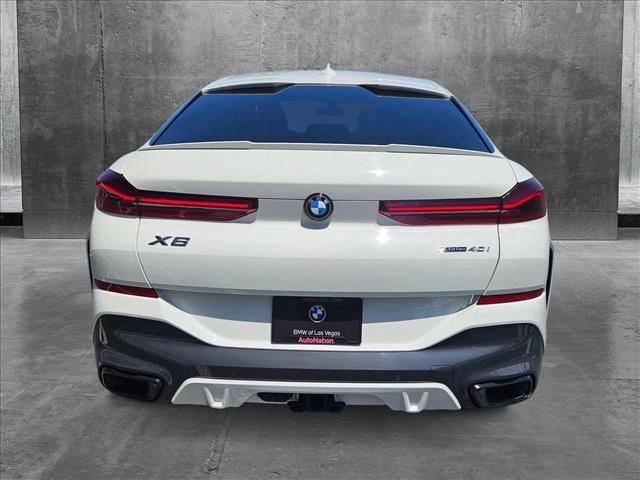 used 2023 BMW X6 car, priced at $54,997