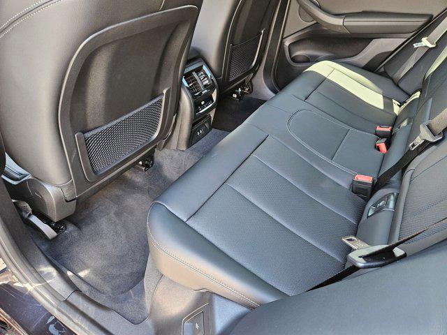 new 2025 BMW X4 car, priced at $63,335