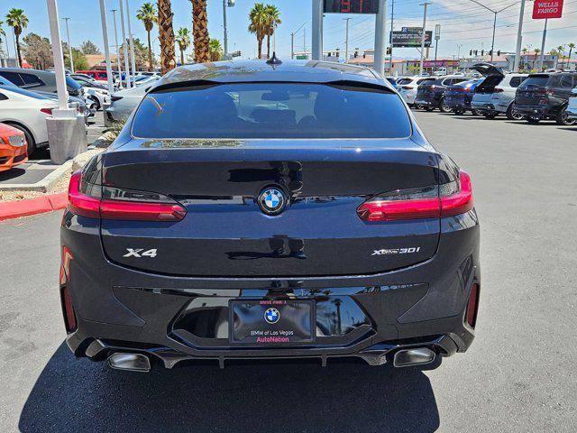 new 2025 BMW X4 car, priced at $63,335