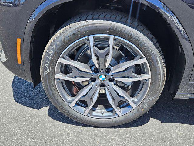 new 2025 BMW X4 car, priced at $63,335