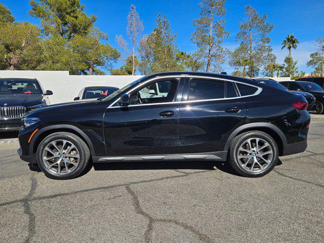 used 2022 BMW X6 car, priced at $58,240