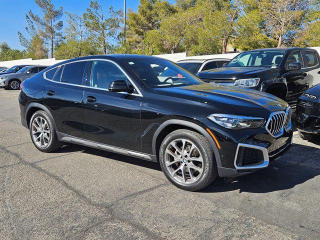 used 2022 BMW X6 car, priced at $58,240