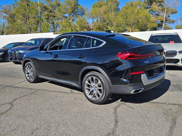 used 2022 BMW X6 car, priced at $58,240