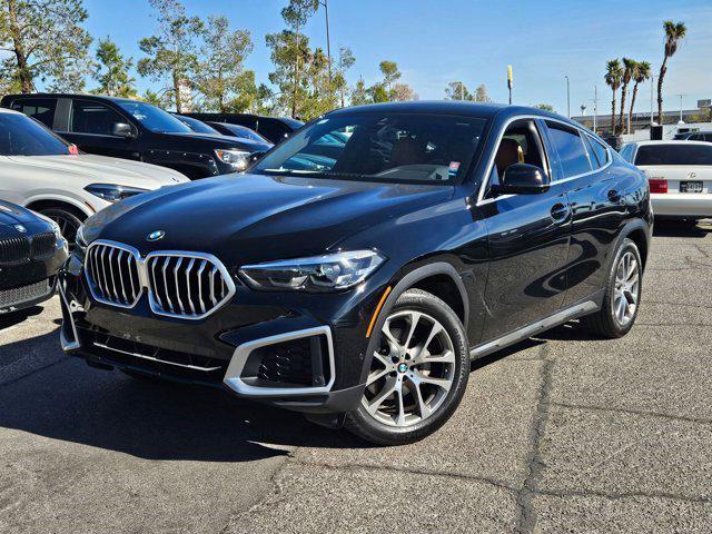 used 2022 BMW X6 car, priced at $58,240