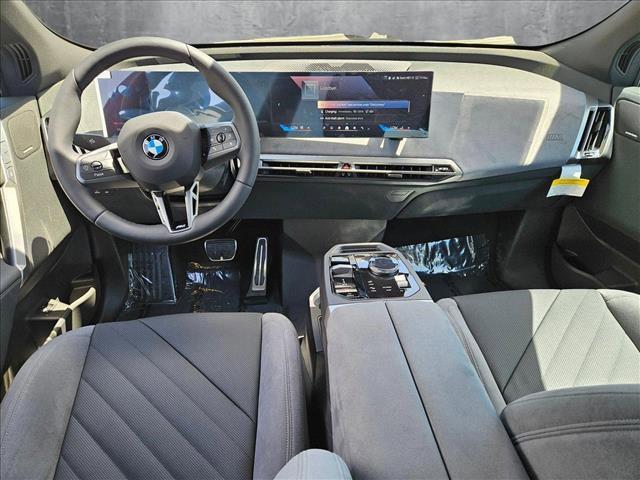 new 2026 BMW iX car, priced at $97,425