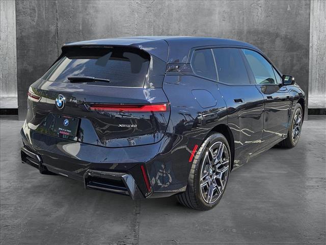 new 2026 BMW iX car, priced at $97,425
