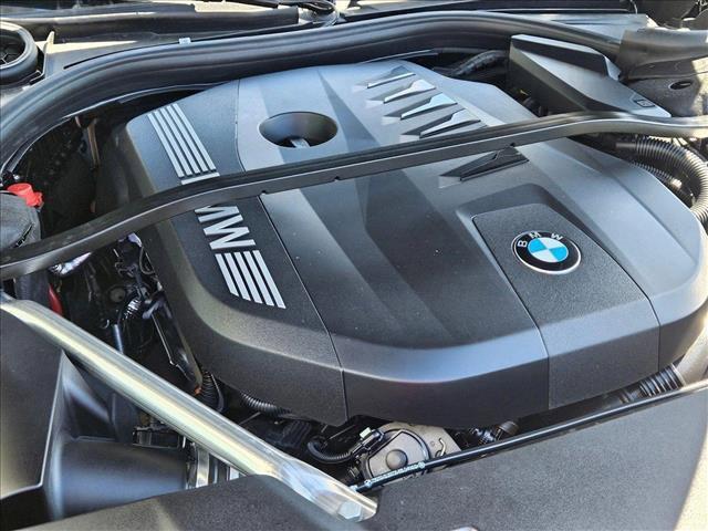 used 2023 BMW 740 car, priced at $74,363
