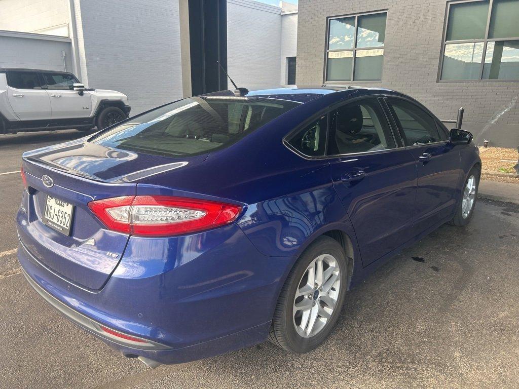 used 2016 Ford Fusion car, priced at $10,750