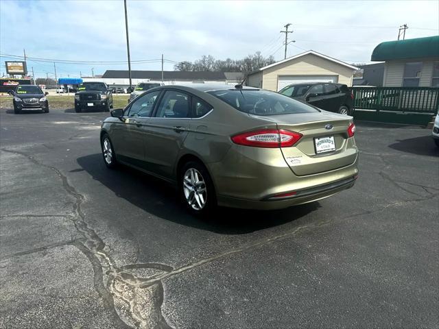 used 2013 Ford Fusion car, priced at $6,995