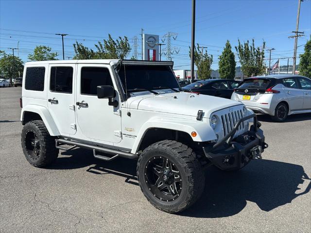 used 2015 Jeep Wrangler Unlimited car, priced at $23,440