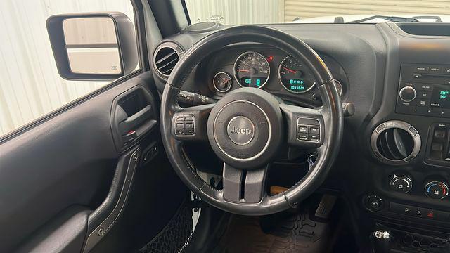 used 2015 Jeep Wrangler Unlimited car, priced at $20,950