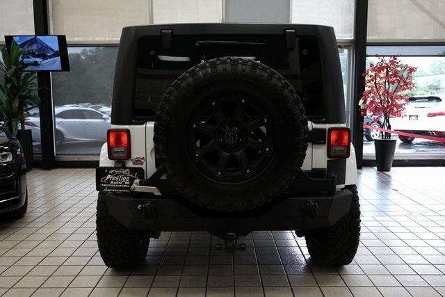 used 2013 Jeep Wrangler Unlimited car, priced at $17,971