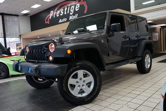 used 2017 Jeep Wrangler Unlimited car, priced at $22,588