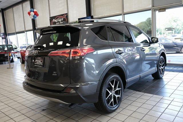 used 2018 Toyota RAV4 car, priced at $21,655