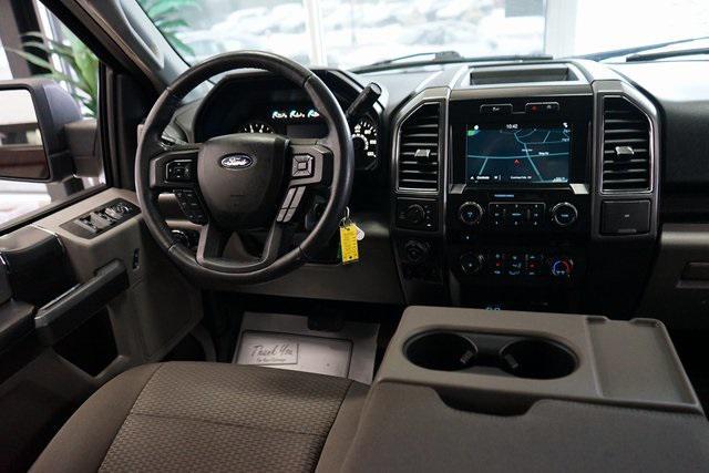 used 2018 Ford F-150 car, priced at $23,054