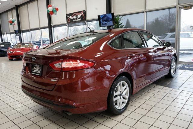 used 2014 Ford Fusion car, priced at $7,777