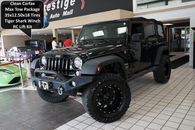 used 2014 Jeep Wrangler Unlimited car, priced at $16,785