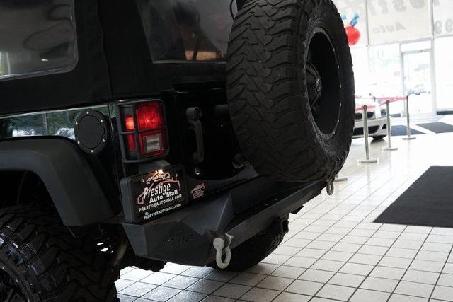 used 2014 Jeep Wrangler Unlimited car, priced at $16,785
