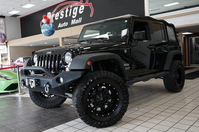 used 2014 Jeep Wrangler Unlimited car, priced at $16,785