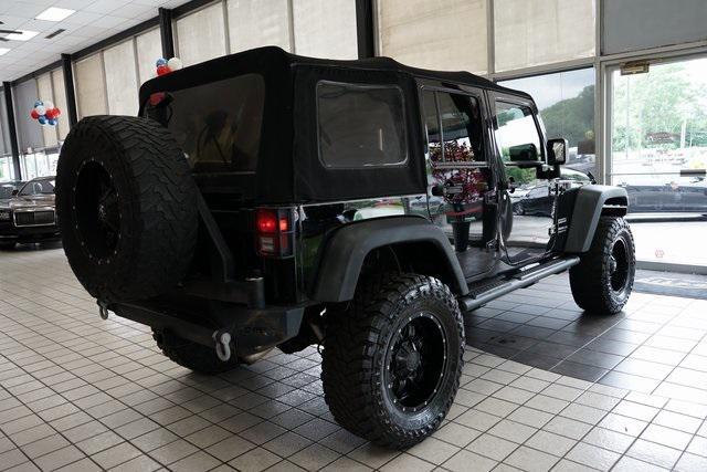 used 2014 Jeep Wrangler Unlimited car, priced at $16,785