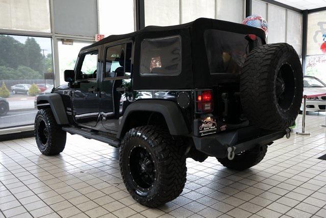 used 2014 Jeep Wrangler Unlimited car, priced at $16,785