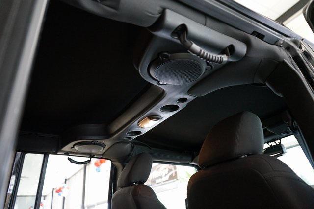 used 2014 Jeep Wrangler Unlimited car, priced at $16,785