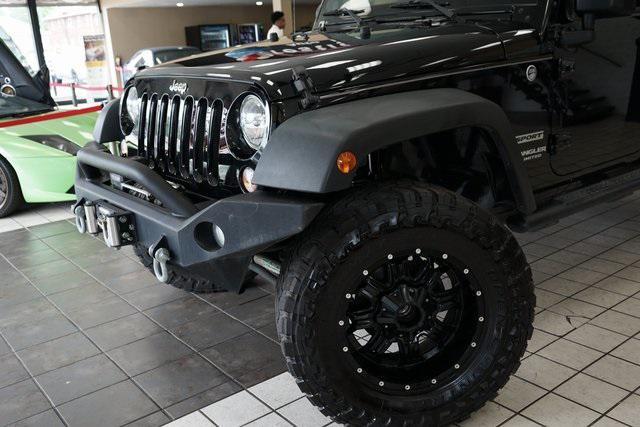 used 2014 Jeep Wrangler Unlimited car, priced at $16,785