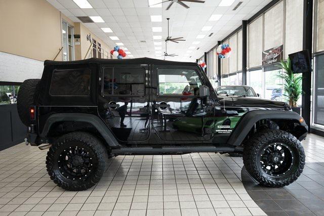 used 2014 Jeep Wrangler Unlimited car, priced at $16,785