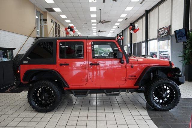 used 2013 Jeep Wrangler Unlimited car, priced at $15,991