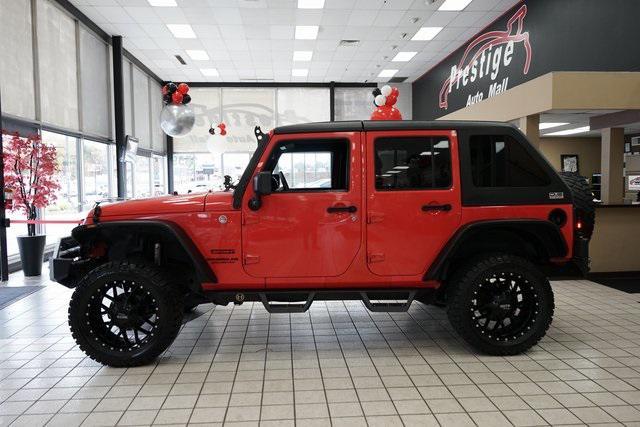 used 2013 Jeep Wrangler Unlimited car, priced at $15,991