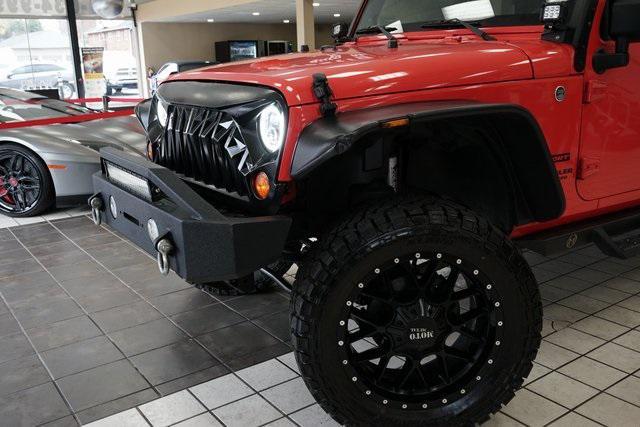 used 2013 Jeep Wrangler Unlimited car, priced at $15,991