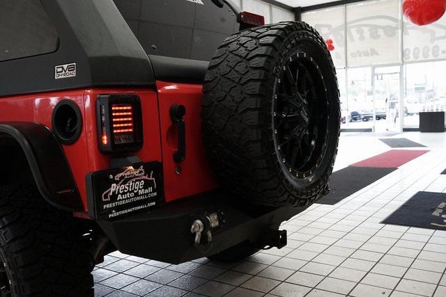 used 2013 Jeep Wrangler Unlimited car, priced at $15,991