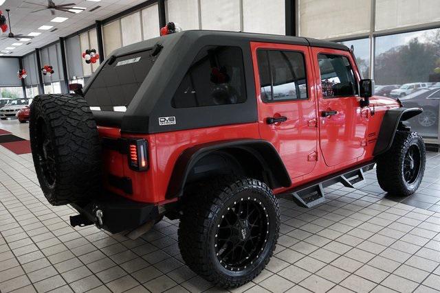 used 2013 Jeep Wrangler Unlimited car, priced at $15,991