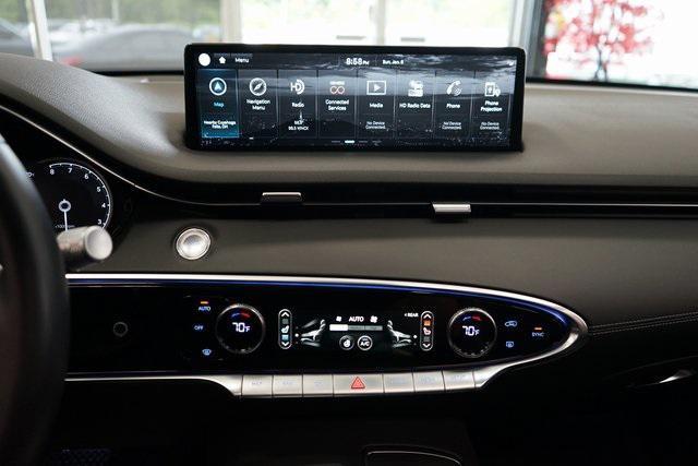 used 2023 Genesis GV70 car, priced at $38,985