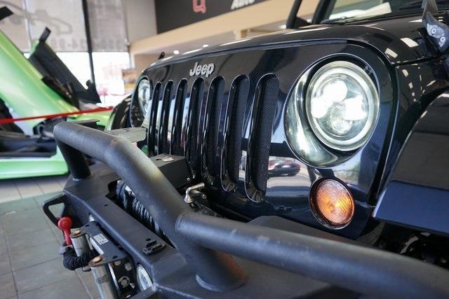 used 2015 Jeep Wrangler Unlimited car, priced at $21,488