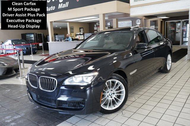 used 2014 BMW 750 car, priced at $15,555