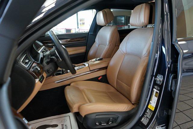 used 2014 BMW 750 car, priced at $15,555