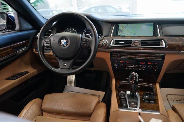 used 2014 BMW 750 car, priced at $15,555