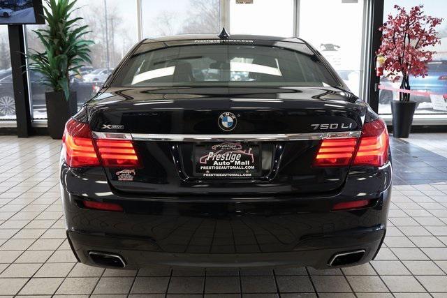 used 2014 BMW 750 car, priced at $15,555