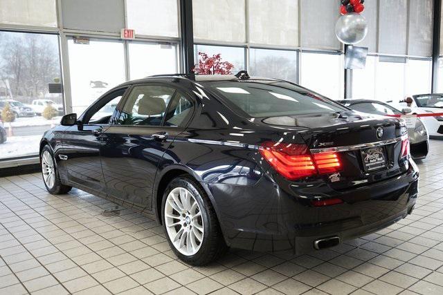 used 2014 BMW 750 car, priced at $15,555